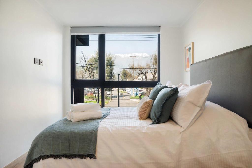 Ένα ή περισσότερα κρεβάτια σε δωμάτιο στο 8550 Las Condes Suites by Andes STR