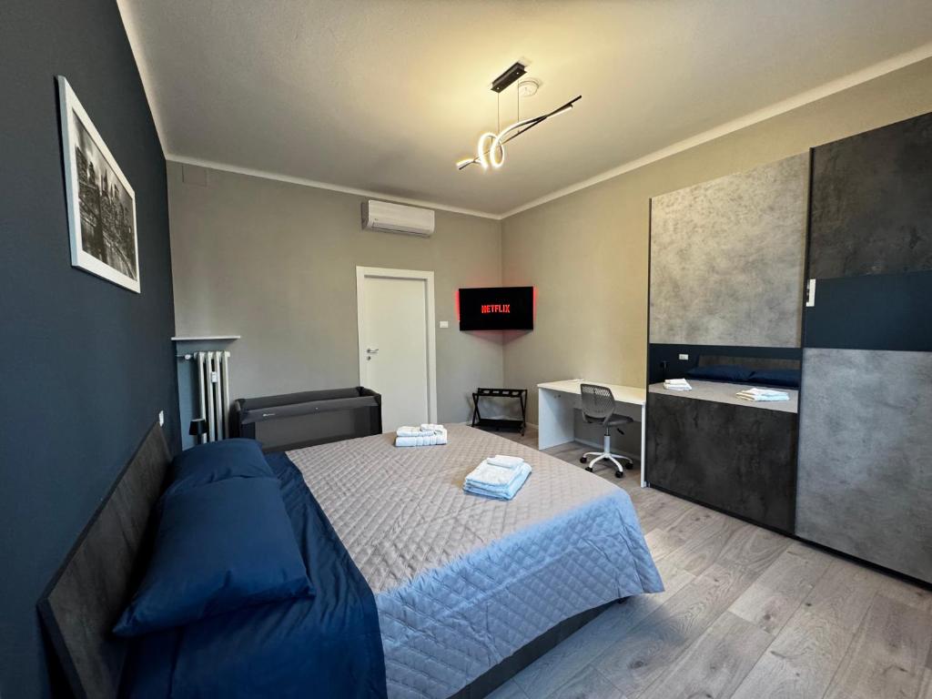 レッジョ・エミリアにあるDream Houseのベッドと洗面台のある寝室