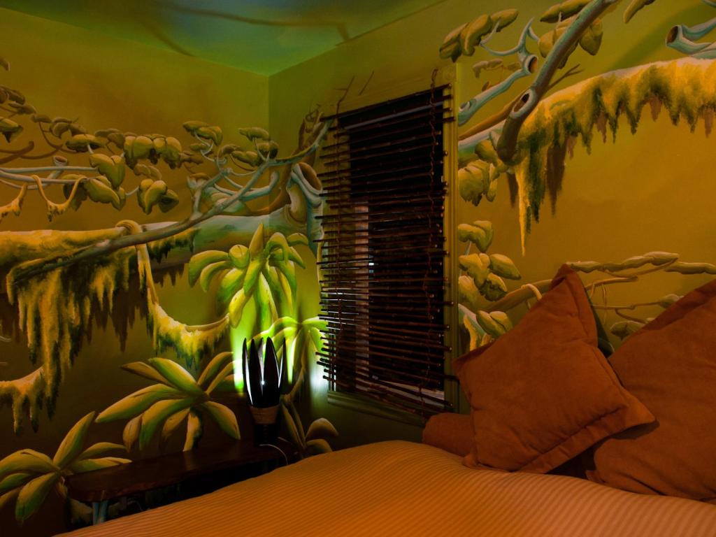Katil atau katil-katil dalam bilik di Gîte Crystal Inn