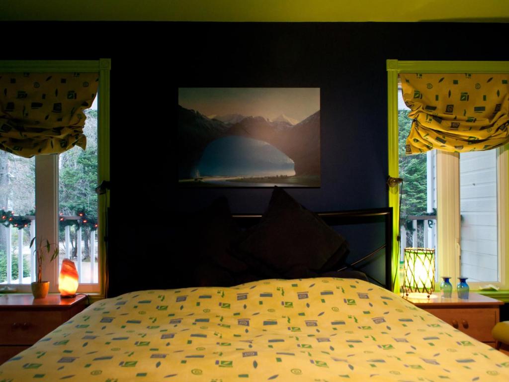 Katil atau katil-katil dalam bilik di Gîte Crystal Inn