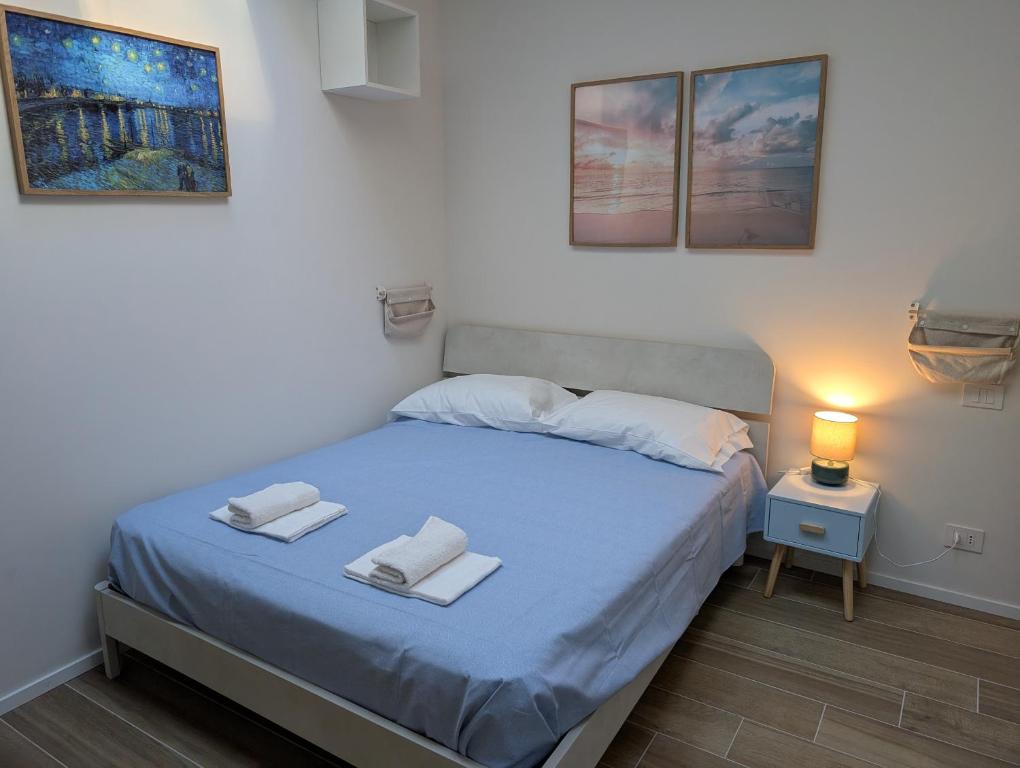 En eller flere senge i et værelse på Loft Vanchiglia