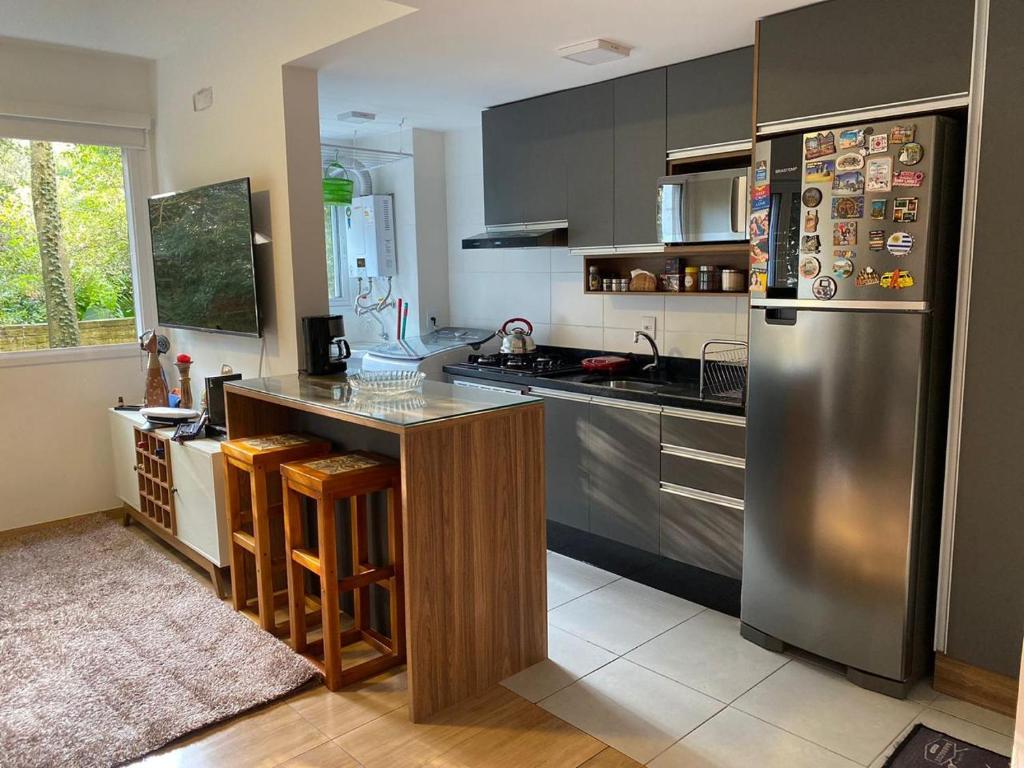 Køkken eller tekøkken på Apto confortável com vista para a natureza