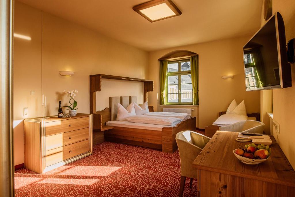 Postel nebo postele na pokoji v ubytování Hotel Freyhof