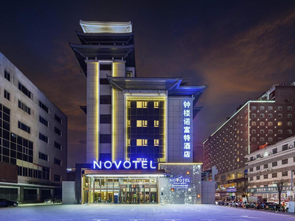 a building with a no hotel sign at night at Novotel Xi'an The Bell Tower in Xi'an