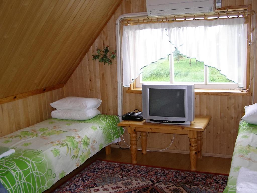 Postel nebo postele na pokoji v ubytování Treimani Puhkemaja