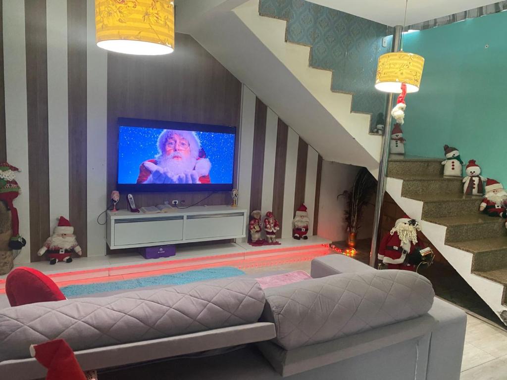 TV in/ali zabaviščno središče v nastanitvi Loft Aconchegante