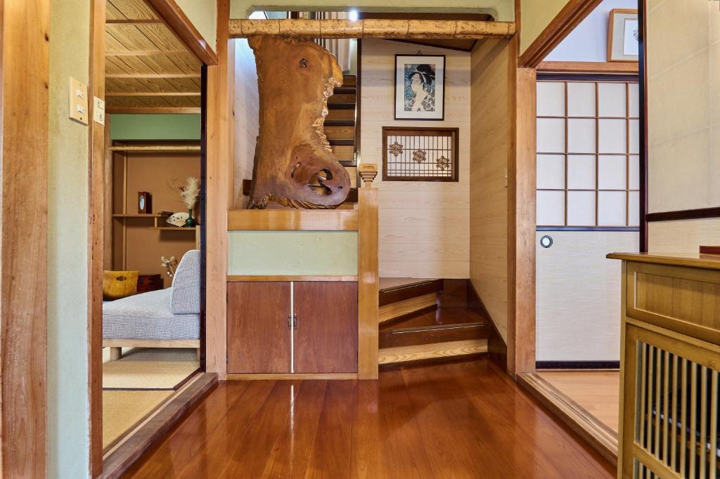 Postel nebo postele na pokoji v ubytování Takayama abode Private House in Takayama