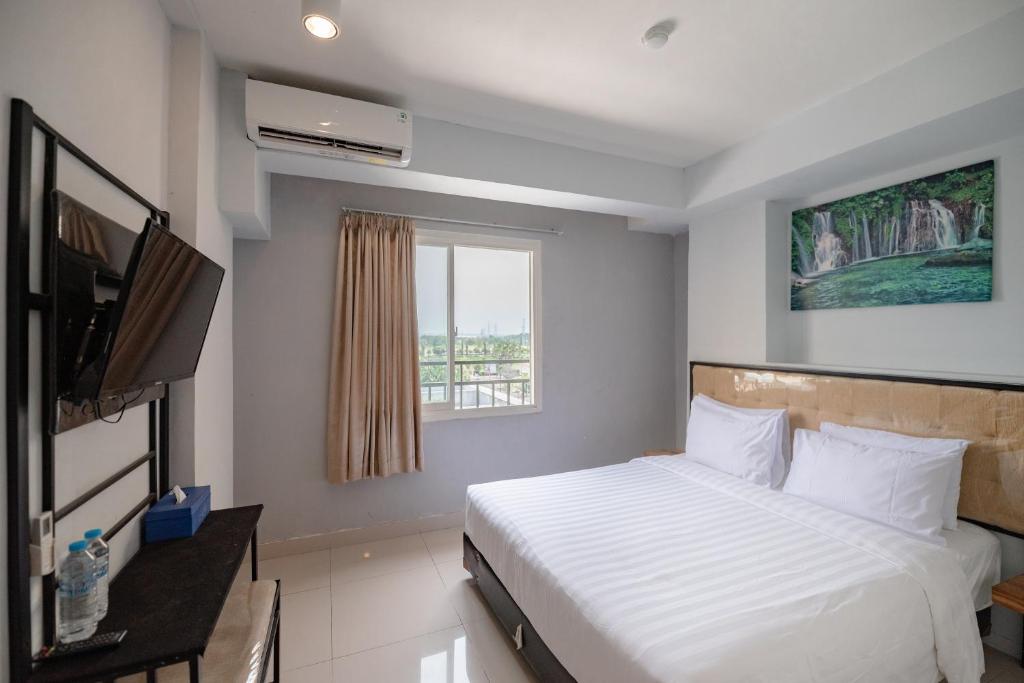 De La Charis Hotel by Waringin Hospitality - Habitación Doble Deluxe