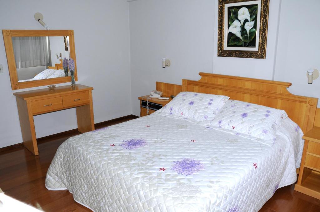 Postel nebo postele na pokoji v ubytování Hotel Elite