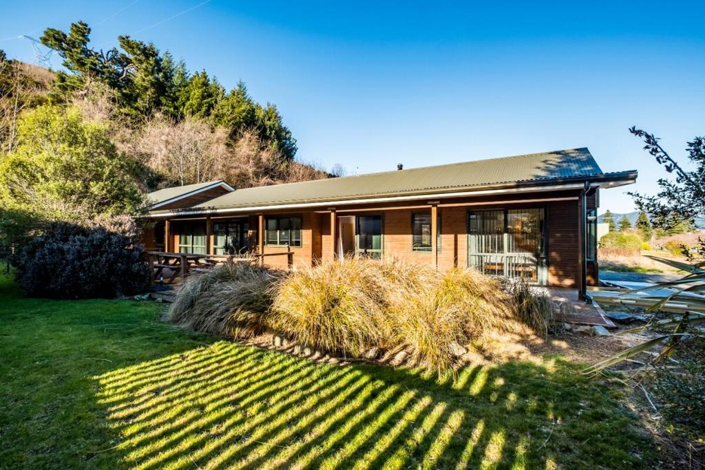 a house with a vineyard in front of it at 130 Jacks Pass Road in Hanmer Springs