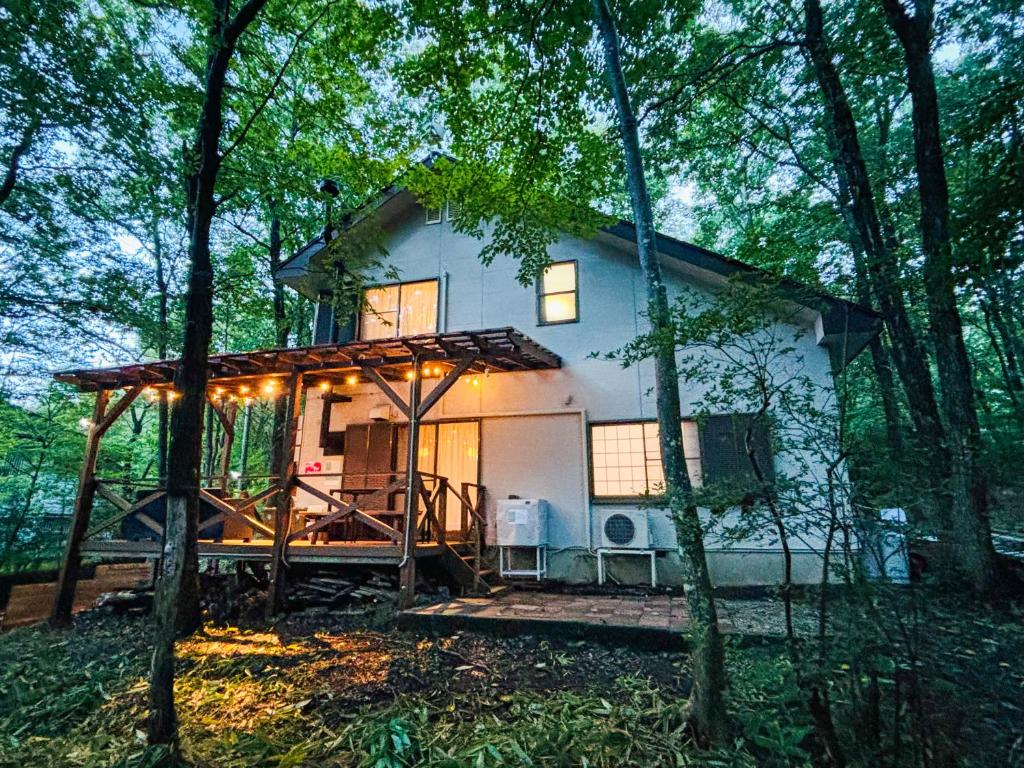 a tiny house in the middle of the woods at Villa Foresta TERU in Nasu