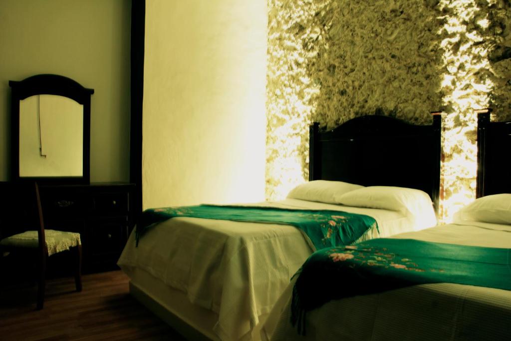 Postel nebo postele na pokoji v ubytování Hotel Zamna Boutique