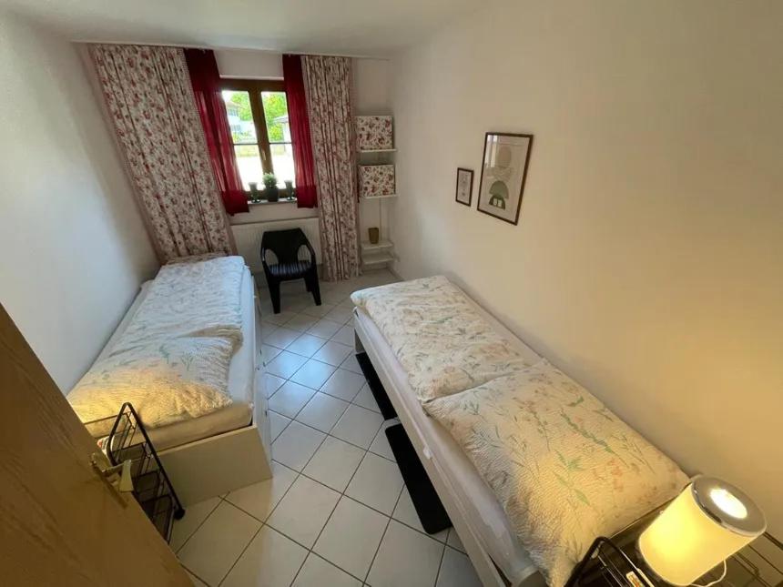 Ένα ή περισσότερα κρεβάτια σε δωμάτιο στο Alpenjuwel