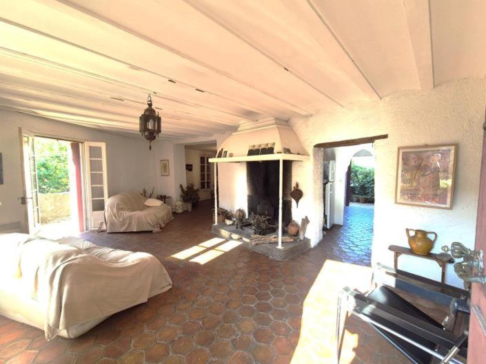 a large room with a fireplace in a bedroom at Escape to your dream Samui beach Villa ! in Ban Na We