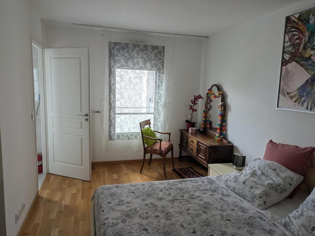Postel nebo postele na pokoji v ubytování Beautiful flat around Geneva & its airport Palexpo