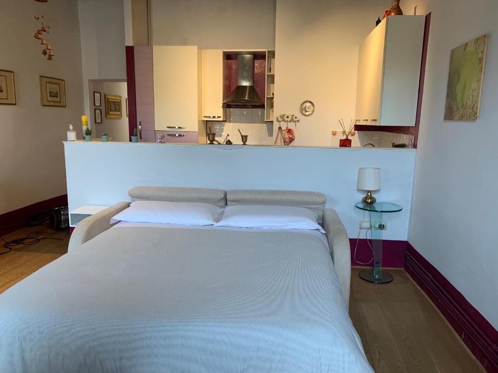 Ένα ή περισσότερα κρεβάτια σε δωμάτιο στο Aurora 88 Apartments