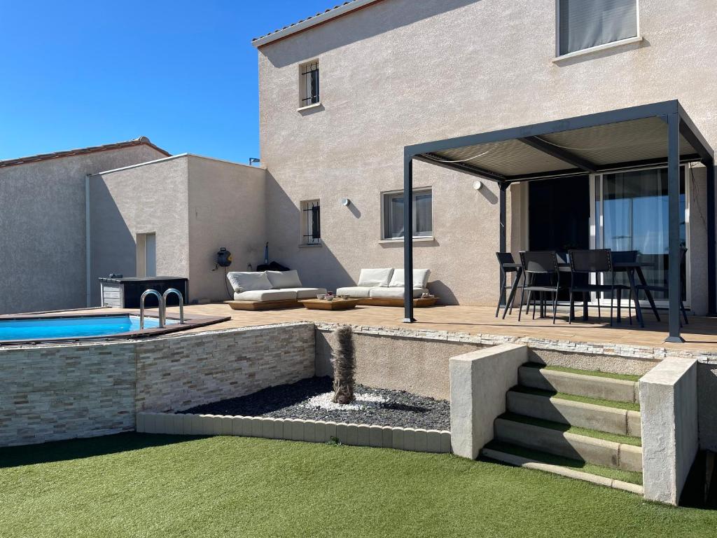 Πισίνα στο ή κοντά στο Charmante maison avec petite piscine et jardin