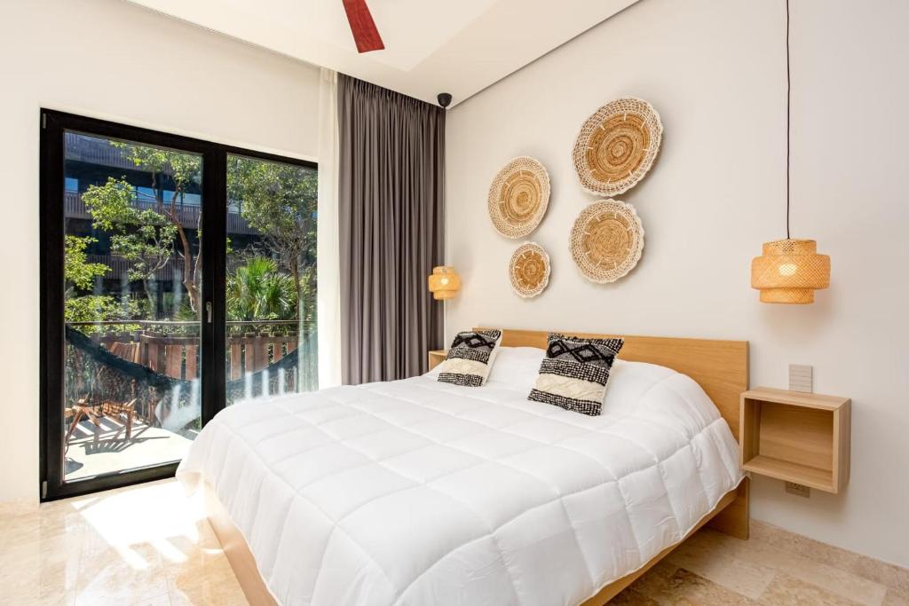 Ένα ή περισσότερα κρεβάτια σε δωμάτιο στο Amira District