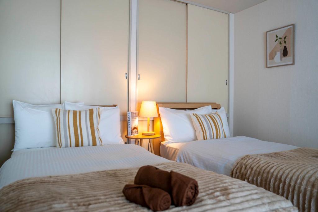Den SUSUKINO ROOMS