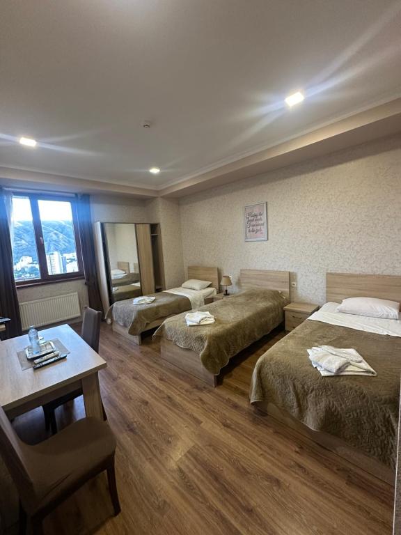 Postel nebo postele na pokoji v ubytování Apart Hotel Four Rooms