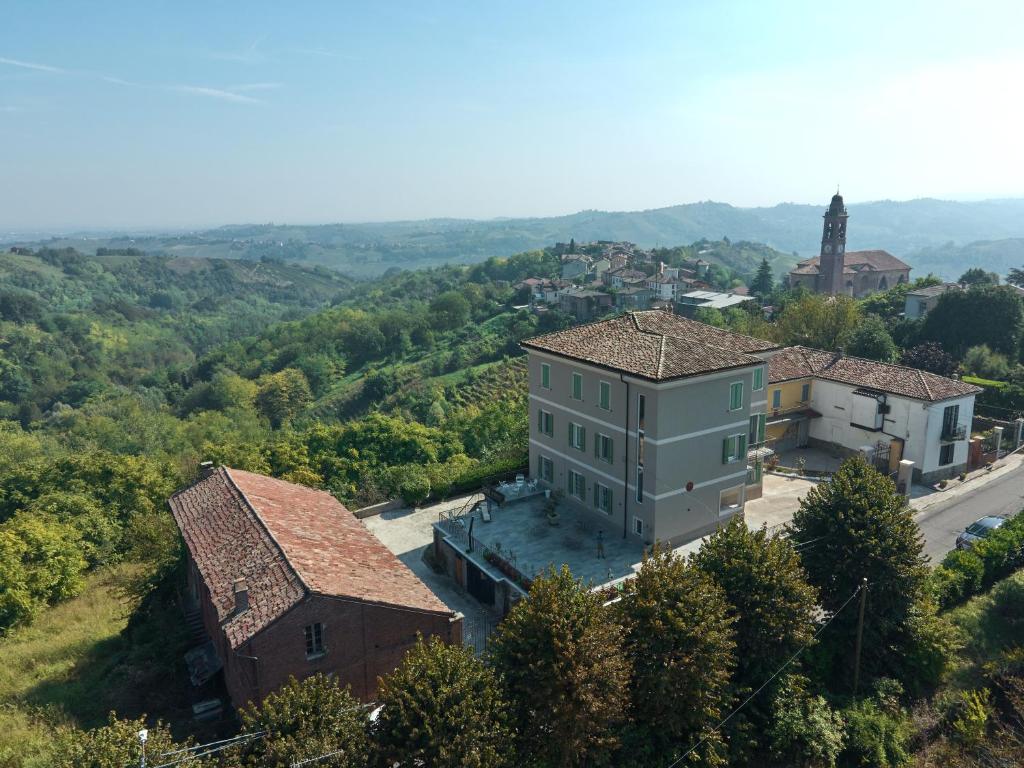an aerial view of a building on a hill at Oltre Natura in Canneto Pavese