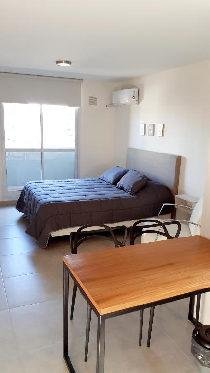 Llit o llits en una habitació de Sortie Independencia