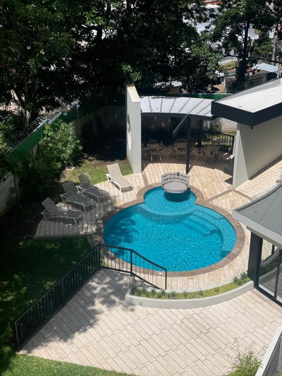 Kolam renang di atau dekat dengan Moderno apart en Col Escalón,vista,piscina,gimnasio