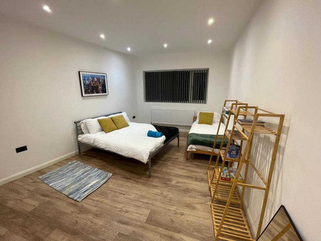 Katil atau katil-katil dalam bilik di Groby Heights by Nestura