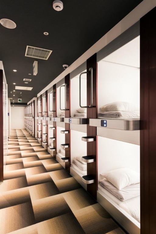Postel nebo postele na pokoji v ubytování Hotel M Matsumoto