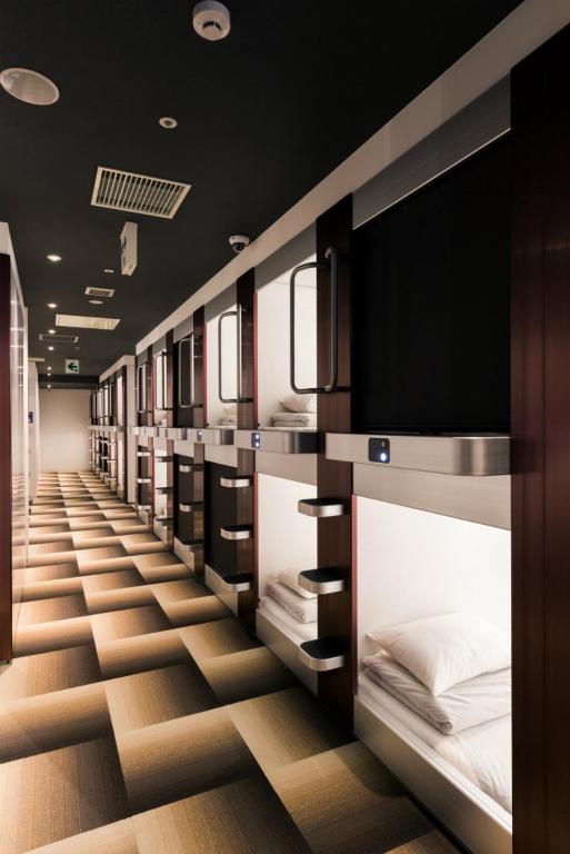 Postel nebo postele na pokoji v ubytování Hotel M Matsumoto