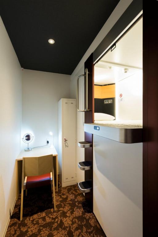 Postel nebo postele na pokoji v ubytování Hotel M Matsumoto