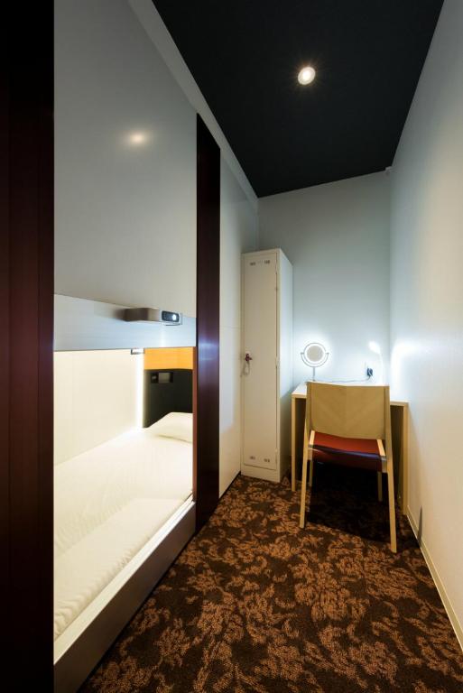 Postel nebo postele na pokoji v ubytování Hotel M Matsumoto