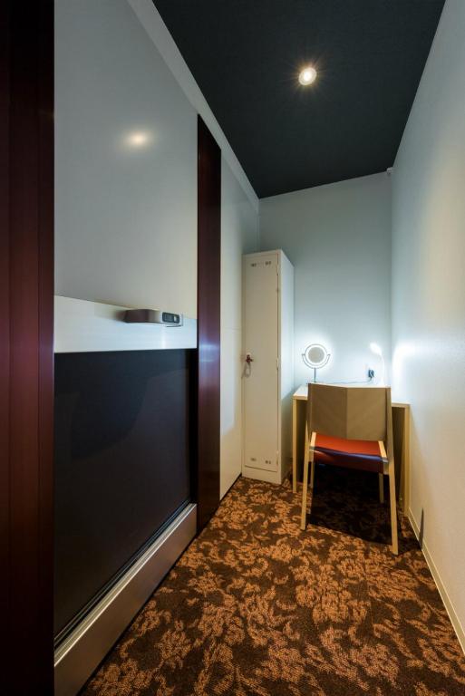 Postel nebo postele na pokoji v ubytování Hotel M Matsumoto