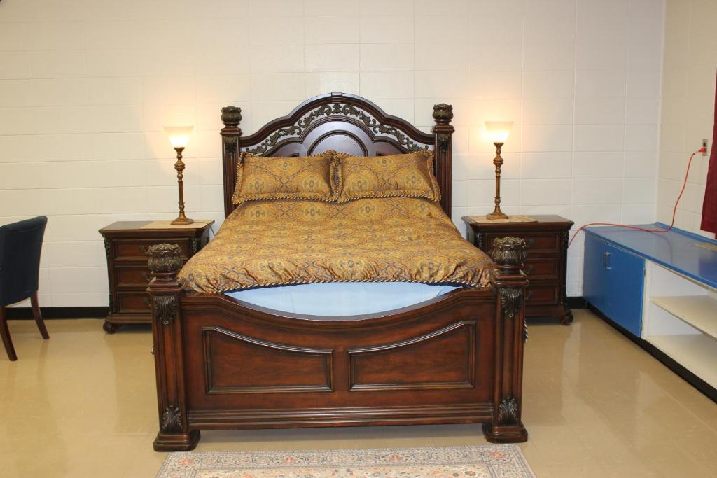 En eller flere senge i et værelse på Le Vignoble de l'École