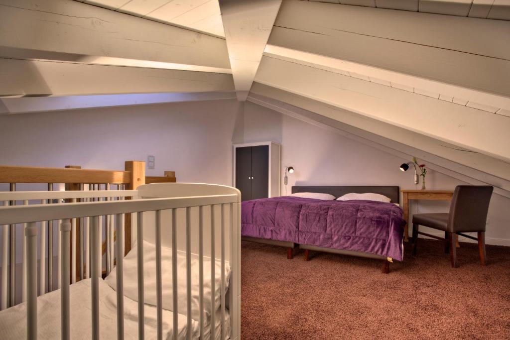 Postel nebo postele na pokoji v ubytování Suite Hotel Binz Familienhotel Rügen