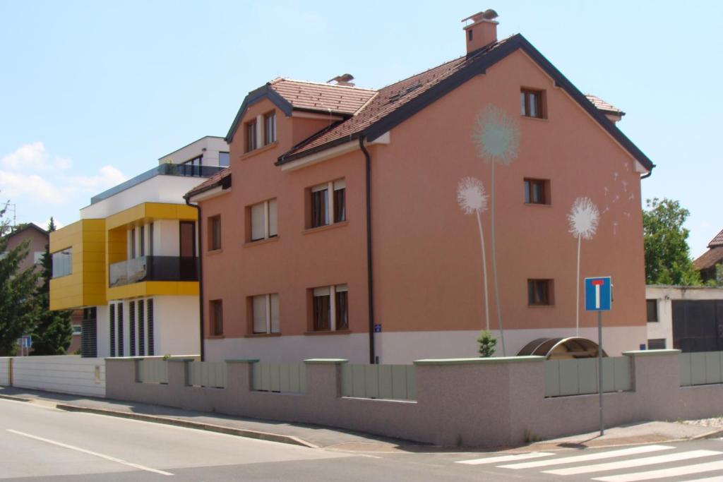 a building on the side of a street at Apartmani Maltar in Varaždin