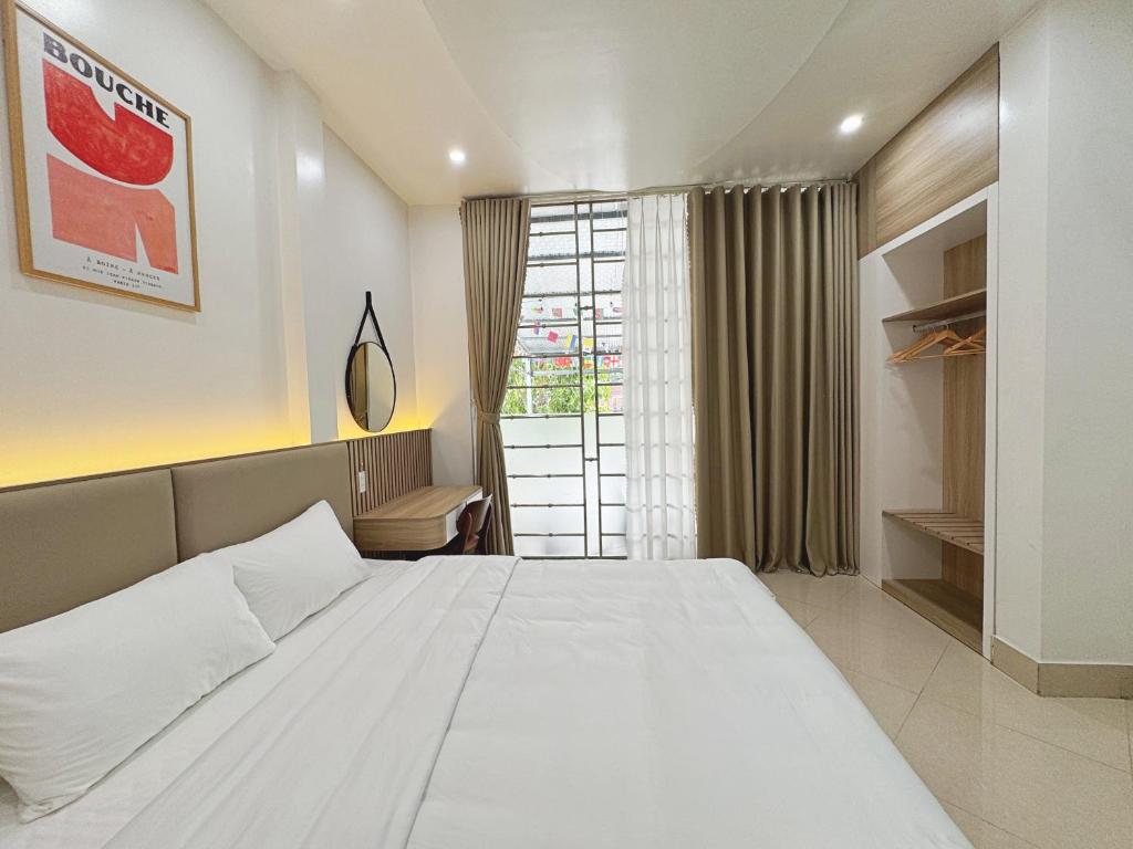 Ένα ή περισσότερα κρεβάτια σε δωμάτιο στο RAW Hostel - Ha Giang Loop Tour & Motorbikes Rental