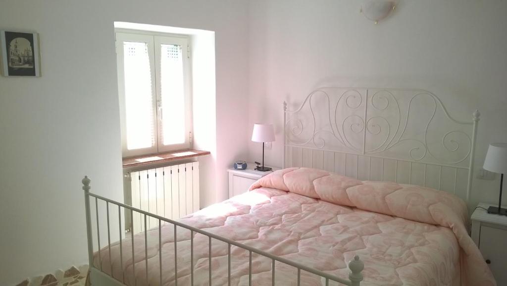 Postel nebo postele na pokoji v ubytování B&B I Tre Bassotti