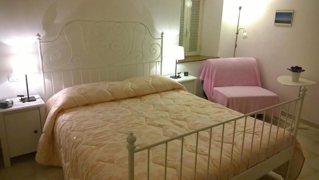 Postel nebo postele na pokoji v ubytování B&B I Tre Bassotti