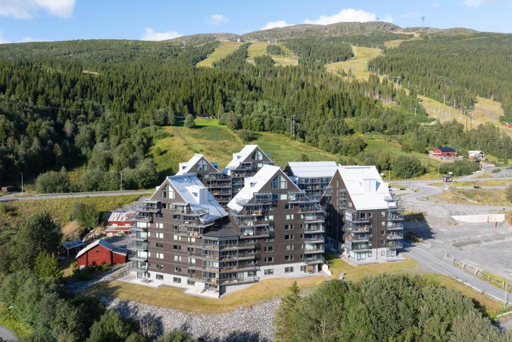an aerial view of an apartment building in the mountains at Åre Travel - View in Åre