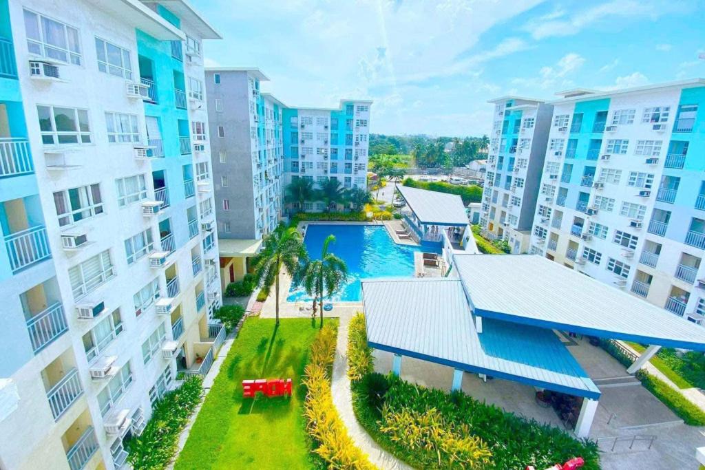 Πισίνα στο ή κοντά στο Modern Cozy 2BR Smart Lock Condo with Netflix 4K and YouTube Premium at Seawind