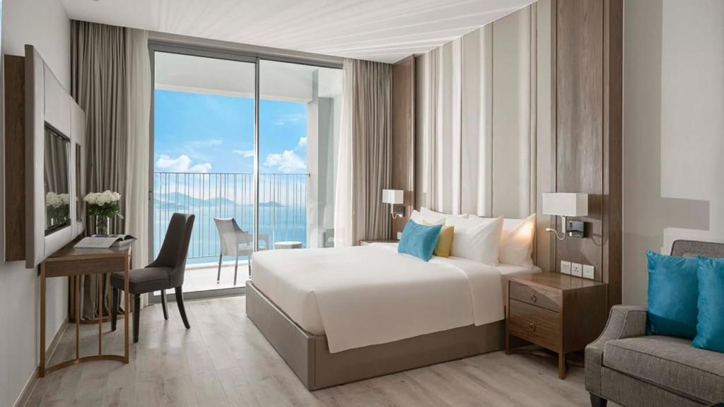 Кровать или кровати в номере HD Panorma Nha Trang Free Pool & Gym Condotel