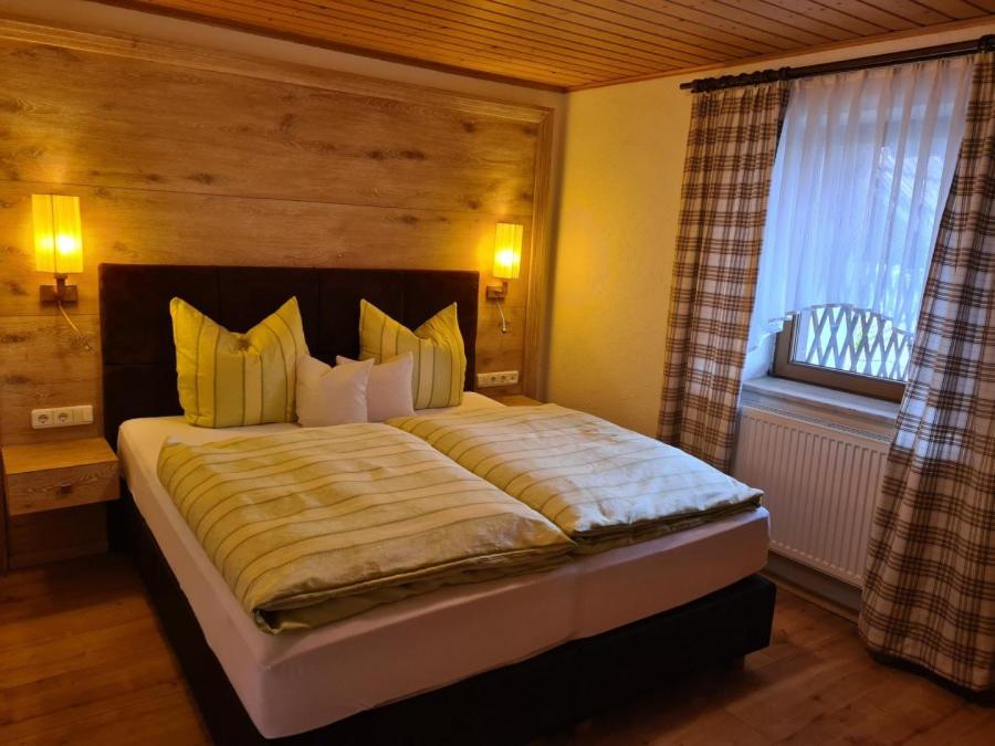 Postel nebo postele na pokoji v ubytování Ferienwohnung wilde Hilde