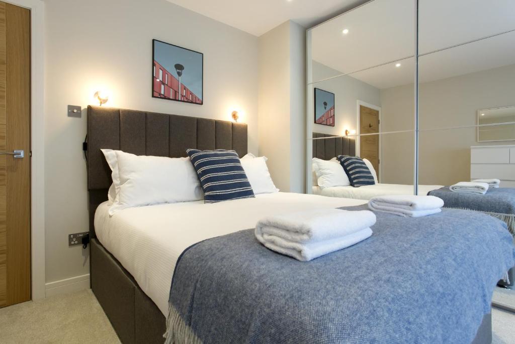 Postelja oz. postelje v sobi nastanitve Madison Hill - Byrne Garden 2 - One bedroom home