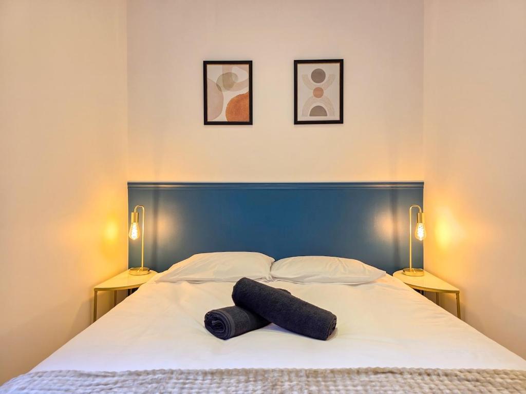 Postel nebo postele na pokoji v ubytování Le Sésame - Centre-Ville, Chic & Parking Gratuit