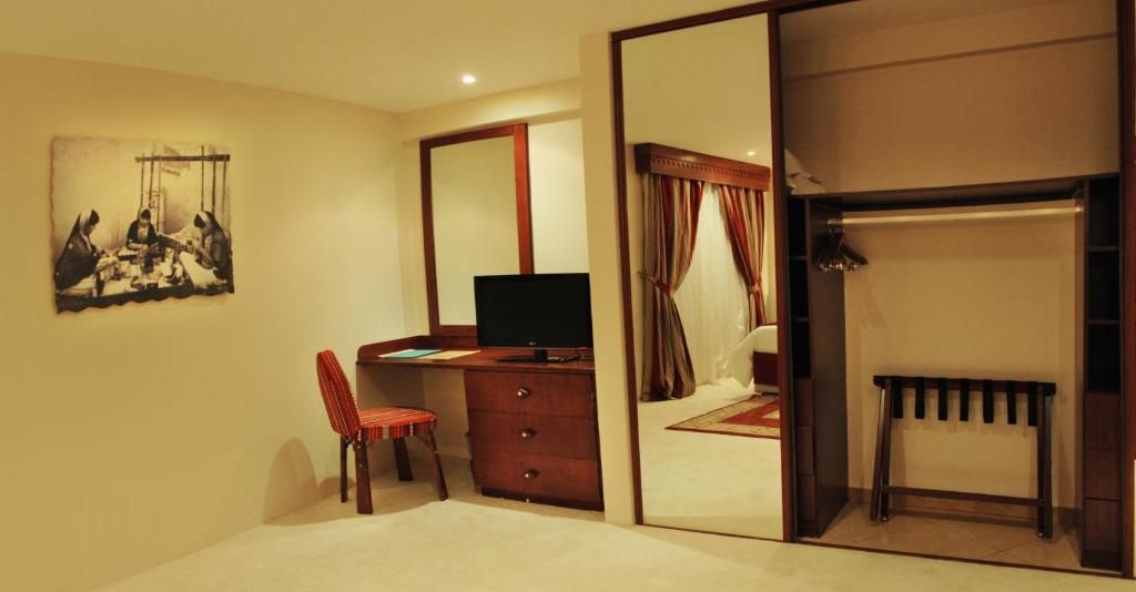 Krevet ili kreveti u jedinici u okviru objekta Al Liwan Suites