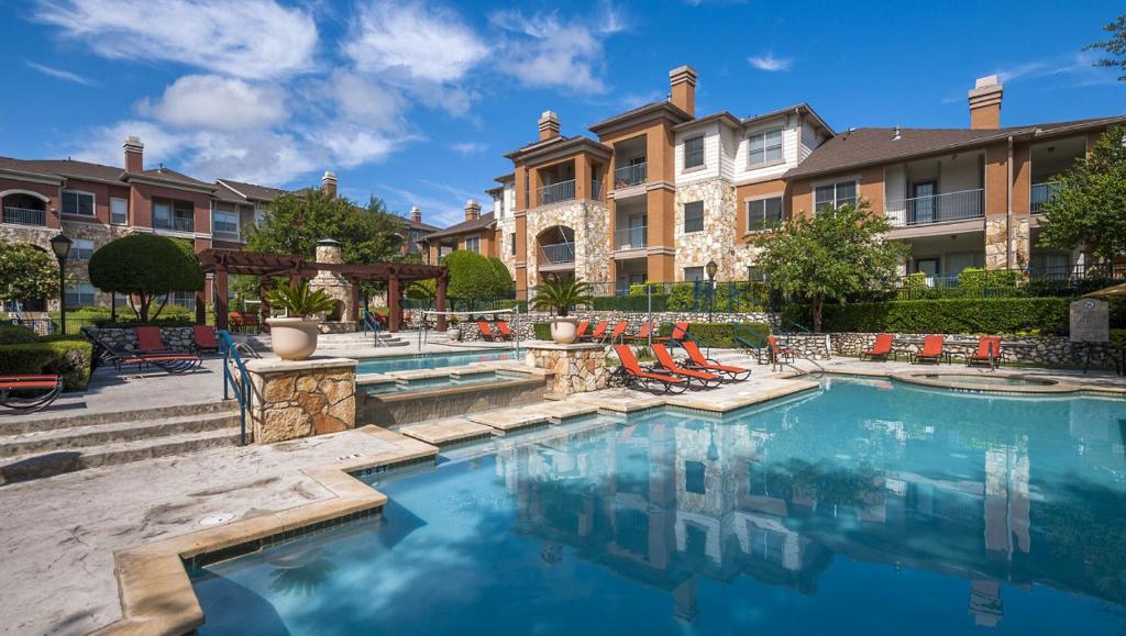 a swimming pool in a yard with a mansion at South Congress Austin Modern 2BR with Pool, Hot Tub, Convenient to Nightlife in Austin