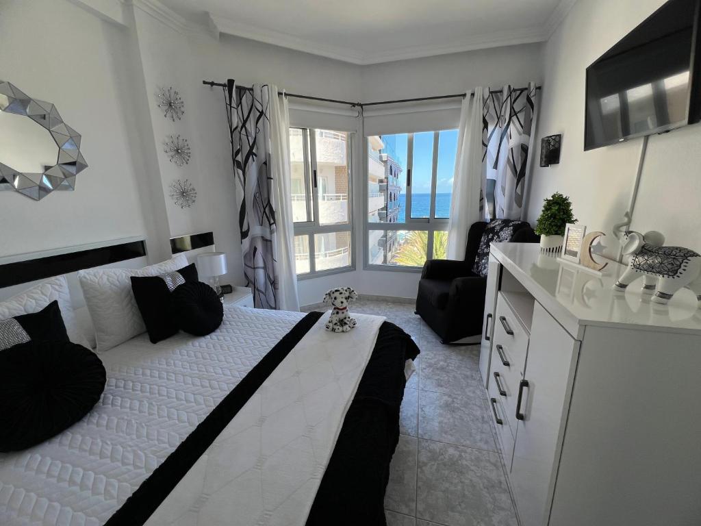 Postel nebo postele na pokoji v ubytování La casita de Omar en el corazón del Puerto de la Cruz