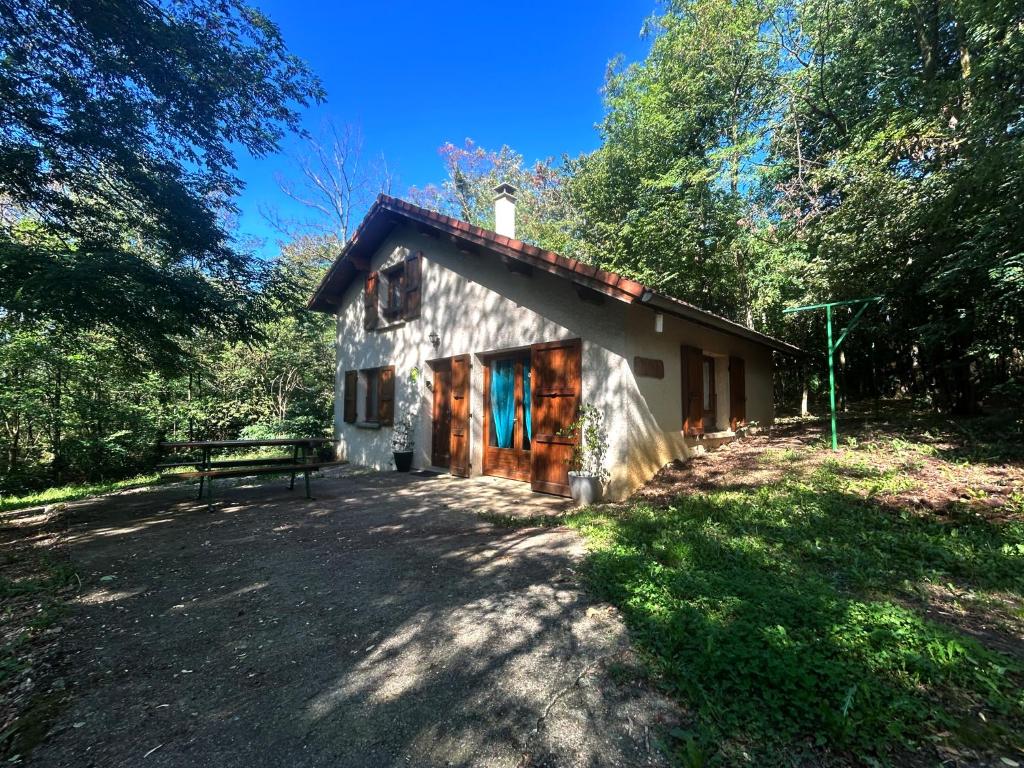 a small house in the middle of a forest at Gîtes de Charme en Isère in Sonnay