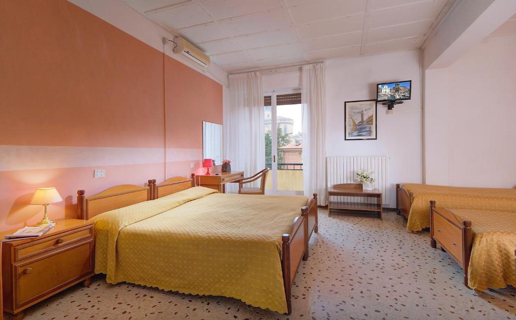 Postel nebo postele na pokoji v ubytování San Gabriele